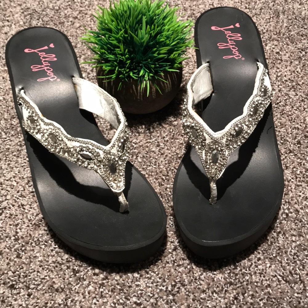 Stunning rhinestone wedges.
